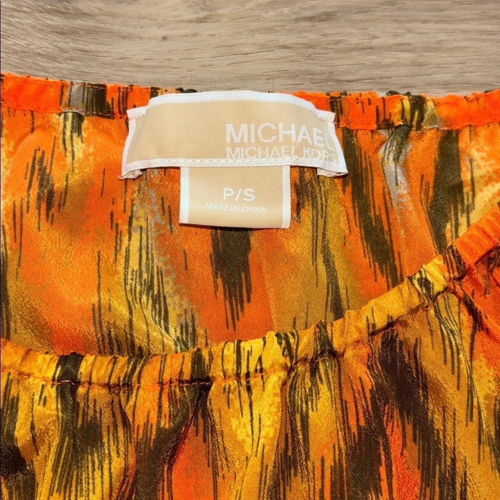 Michael Kors women's short-sleeve orange ikat print blouse with a smocked waist